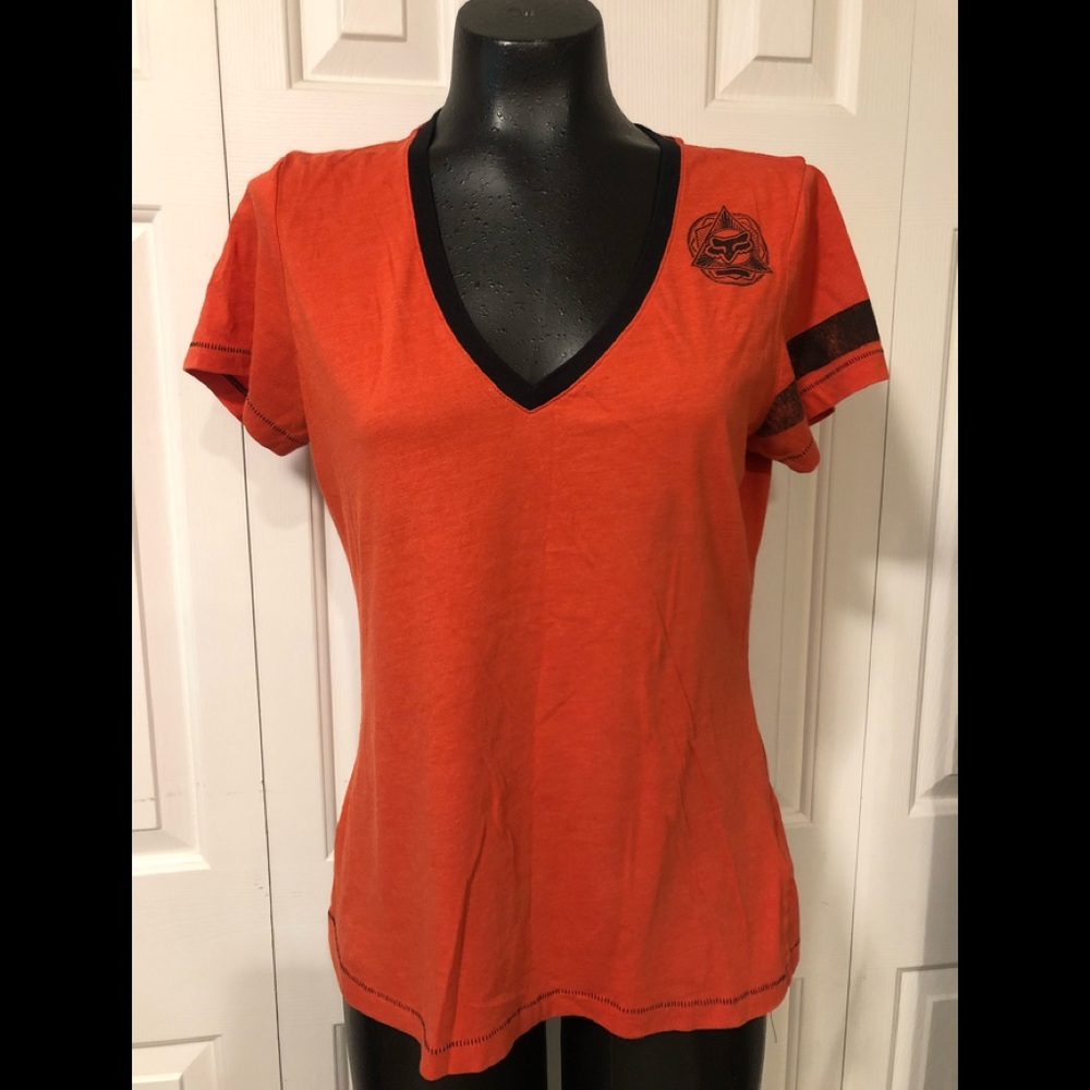 Fox brand size large v neck short sleeve top.